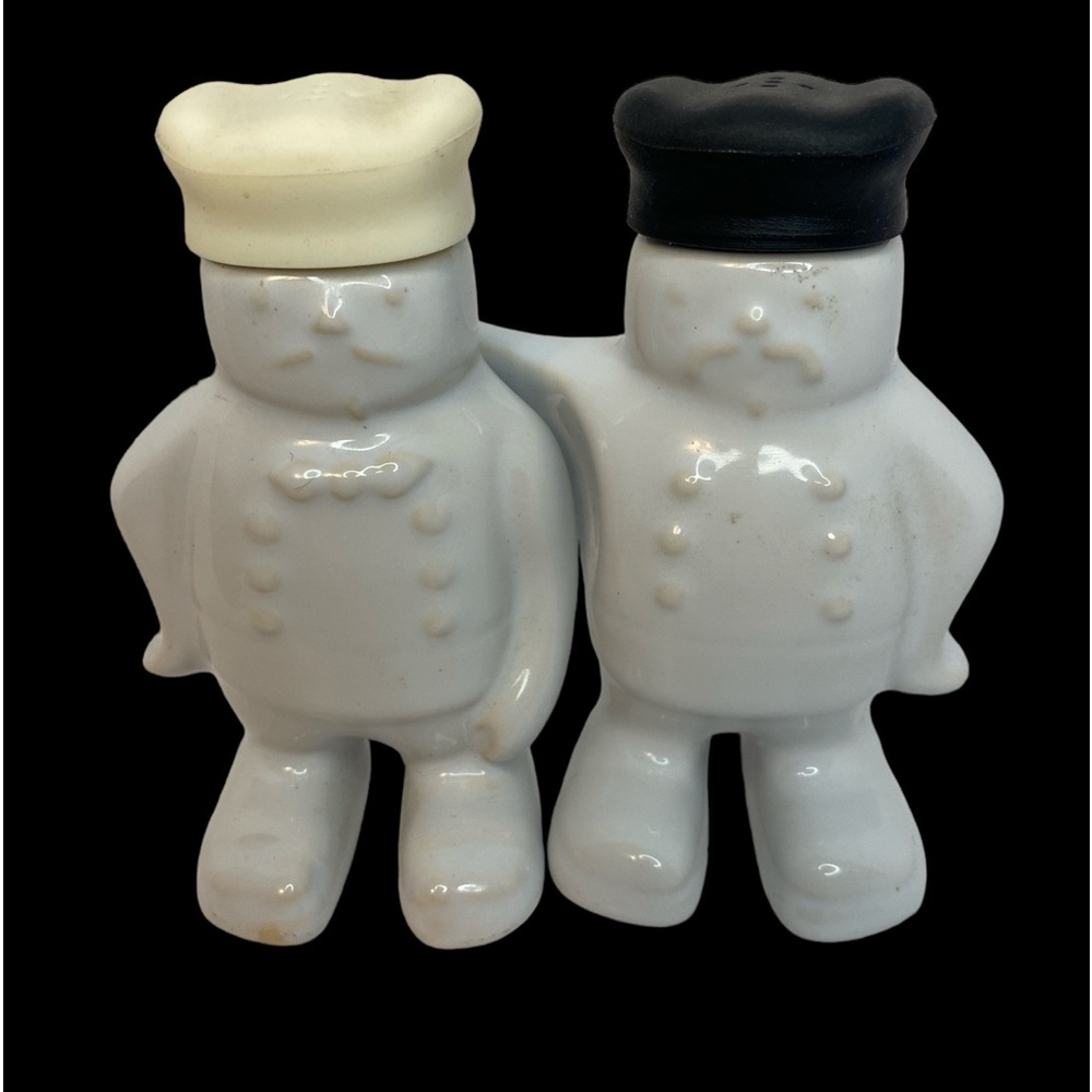Salt and Pepper Shakers Hugging Chefs